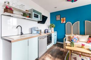 Appartements La Caliente love room glamour balneo en duo : photos des chambres