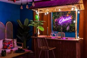 Appartements La Caliente love room glamour balneo en duo : photos des chambres