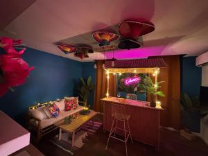 Appartements La Caliente love room glamour balneo en duo : photos des chambres