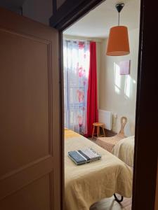 Appartements Le bonheur partage au Puy en Velay : photos des chambres