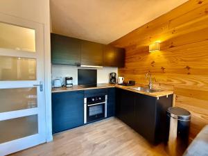 Appart 313, au pied des pistes de ski avec superbe vue