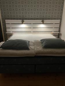 Basic Triple Room with Shared Bathroom room in Trunna Vandrarhem & Konferens