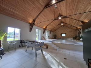 Maisons de vacances La Grange Flor-Alie gite et piscine interieure : photos des chambres