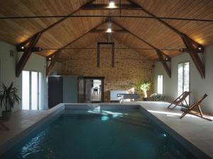 Maisons de vacances La Grange Flor-Alie gite et piscine interieure : photos des chambres