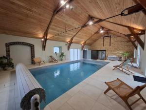 Maisons de vacances La Grange Flor-Alie gite et piscine interieure : photos des chambres