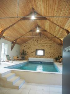 Maisons de vacances La Grange Flor-Alie gite et piscine interieure : photos des chambres