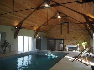 Maisons de vacances La Grange Flor-Alie gite et piscine interieure : photos des chambres