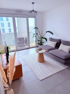 Appartements L-Occitan T2 a 10 minutes du coeur de Toulouse Parking prive et Metro : photos des chambres