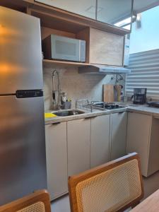 CopaDream - Apartamento moderno com vista para o Cristo Redentor e Mar