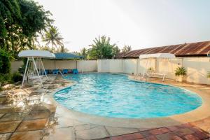 Cosy 1 Bedroom Zing Gardens - E01 with Free Swimming Pool & Garden