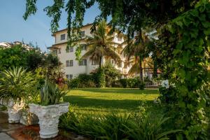 Cosy 1 Bedroom Zing Gardens - E01 with Free Swimming Pool & Garden