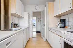 Central lejlighed solrig altan og gratis parkering