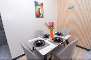 Executive living two bedroom apartment with fully equipped gym swimming pool children playing ground and a relaxing rooftop with amazing scenic city views