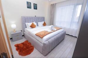 Executive living two bedroom apartment with fully equipped gym swimming pool children playing ground and a relaxing rooftop with amazing scenic city views