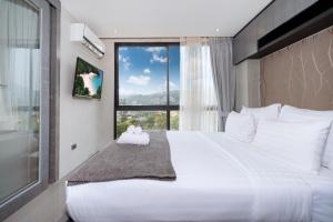 Scenic Hill View Apartment CTG P609 in Tropics Kamala residence, Great Facilities, Close to Beach and Fantasea