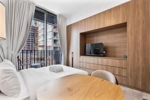 Bright Studio in JVC with Pool and Gym Access