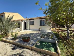 Maisons de vacances Oasis privee a Vendres piscine et confort moderne : photos des chambres