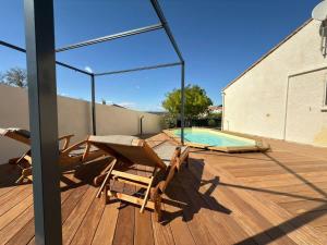 Maisons de vacances Oasis privee a Vendres piscine et confort moderne : photos des chambres