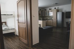 Apartmán Pasohlávky - rodinný komfort se dvěma ložnicemi a kuchyní