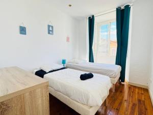 Appartements Confort et charme Appartement a 1 min de la plage : photos des chambres