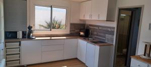 Maisons de vacances CHALET en bois a 600 m de la plage : photos des chambres