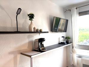 Appartements Studio N210 cozy et fonctionnel : photos des chambres