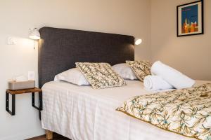 Appartements MonAppart-Hotel - Appartement Lumineux avec Clim et Parking : photos des chambres