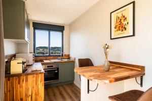 Appartements MonAppart-Hotel - Appartement Lumineux avec Clim et Parking : photos des chambres