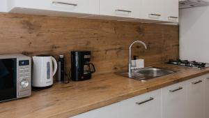 Kopernika 16, Sun & Snow