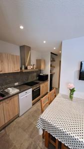 Appartements La loge - EN PLEIN COEUR DU VILLAGE : photos des chambres