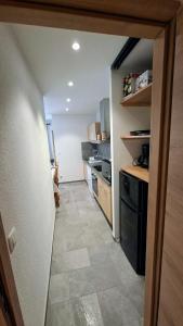Appartements La loge - EN PLEIN COEUR DU VILLAGE : photos des chambres