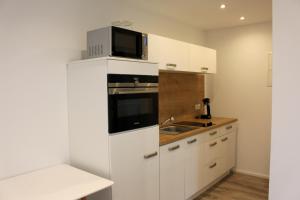 Apartment mit Küche, 2 Einzelbetten, Dusche, Parkplatz, schnellem Internet, ADA7