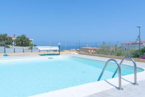 One-Bedroom Apartment with Balcony and Sea View
