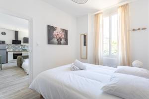 Appartements Curie 1er - Appart cosy & calme a 5 min de la gare : photos des chambres