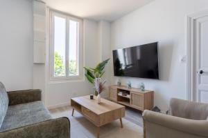 Appartements Curie 1er - Appart cosy & calme a 5 min de la gare : photos des chambres