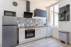 Appartements Curie 1er - Appart cosy & calme a 5 min de la gare : photos des chambres