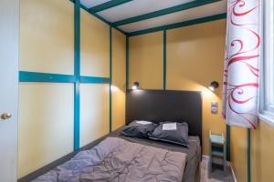 Chalets Cottage 6 personnes climatise : photos des chambres