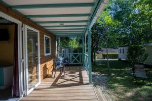 Chalets Cottage 6 personnes climatise : photos des chambres