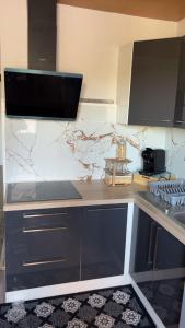 Appartements Le refuge urbain : photos des chambres