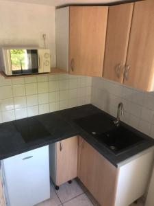 Appartements Les Studios de la Tour - Le Tournesol : photos des chambres