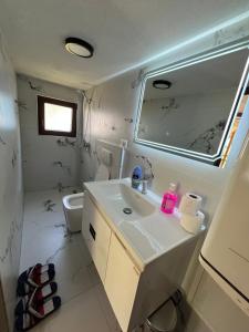 BUJTINA IZET SELIMAj