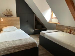 Appartements Le Tokay : photos des chambres