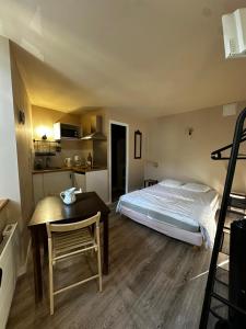 Appartements Studio 5 Aux volets bleus : photos des chambres
