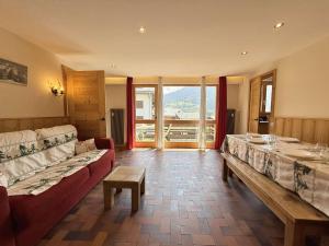 Appartements Appartement cosy au coeur de Praz-Sur-Arly - 5 pers, proche centre et pistes, parking et casier ski - FR-1-603-35 : photos des chambres