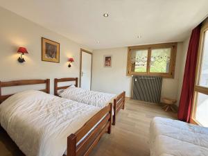 Appartements Appartement cosy au coeur de Praz-Sur-Arly - 5 pers, proche centre et pistes, parking et casier ski - FR-1-603-35 : photos des chambres