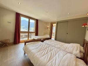 Appartements Appartement cosy au coeur de Praz-Sur-Arly - 5 pers, proche centre et pistes, parking et casier ski - FR-1-603-35 : photos des chambres