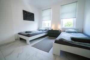 Nord-Apartment 6 I 1 Zimmer mit WLAN, Fußbodenheizung & Walk-In Regendusche