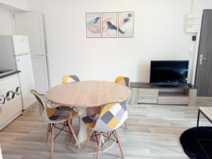 Appartements Une escale bien sympathique : photos des chambres