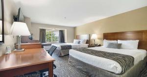 Queen Room with Two Queen Beds room in SureStay Plus Hotel by Best Western Rocklin