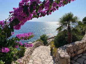 Emerald Dreamscape with Private Beach & Pool